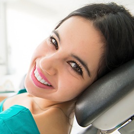 Smiling woman in dental chair