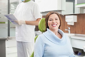 Smiling woman in the dental chair