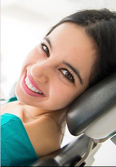 Smiling woman in dental chair