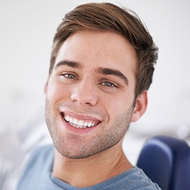 Smiling man in dental chair