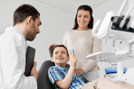 young boy at dentist