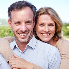 Smiling couple outdoors