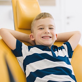 Smiling boy in dental chair