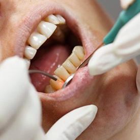 a man undergoing soft tissue laser therapy