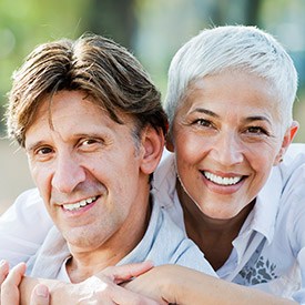 Smiling senior couple outdoors