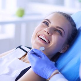 woman smiling at dentist