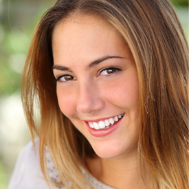 woman smiling outside