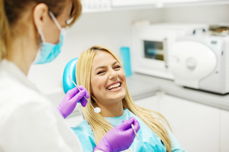 attractive young woman in dentist chair