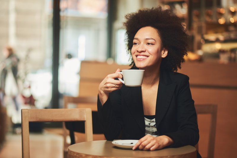 young adult drinking coffee