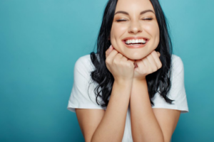 Woman smiling and looking excited